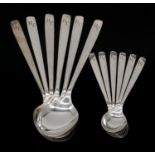 Six German silver dessert spoons along with a set of six matching tea spoons. Hallmarked: 800,