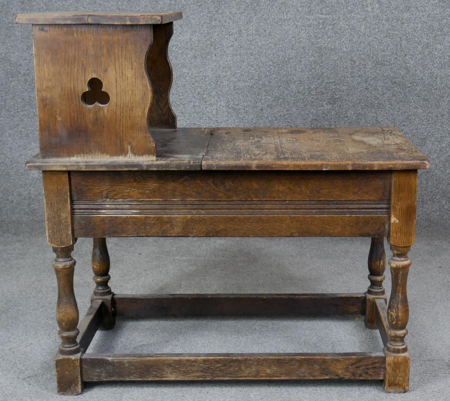 A Jacobean style oak hall table with hinged lidded compartment on turned stretchered supports. H. - Image 3 of 4