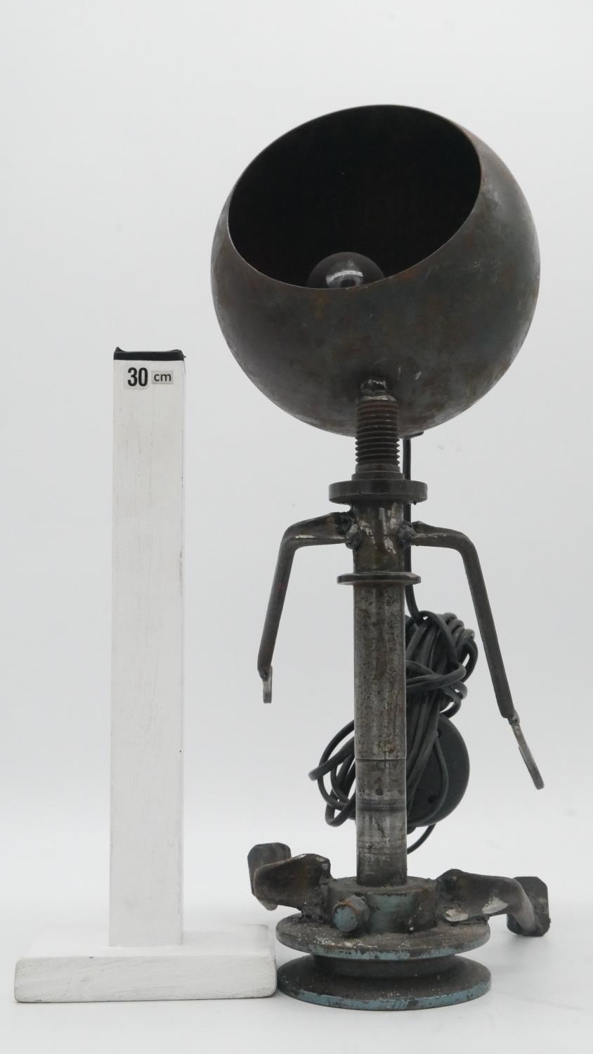 An industrial table lamp in the form of a seated figure with shade for the head. H.45cm - Image 4 of 4