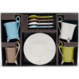 A boxed Bruno Evrard coloured four person coffee set. Each of the cups has a chrome glaze handle and