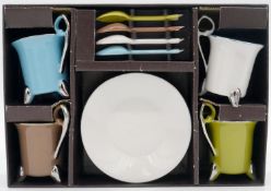 A boxed Bruno Evrard coloured four person coffee set. Each of the cups has a chrome glaze handle and