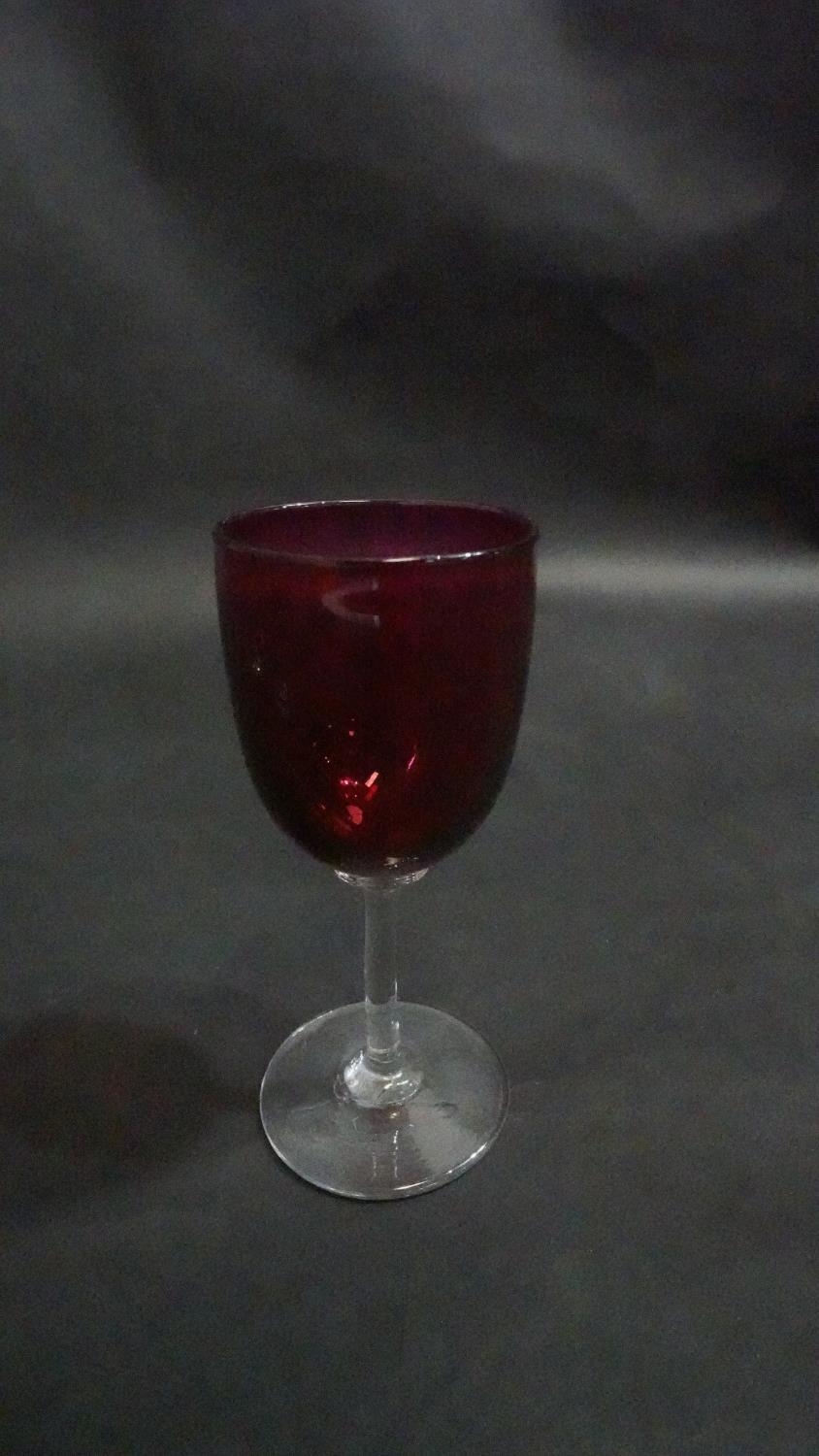 Three Victorian cranberry glass wine glasses along with a pair of antique petal facet liqueur - Image 6 of 8