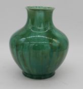 A large turqouise flambe glaze baluster Studio Pottery vase with impressed makers mark to the