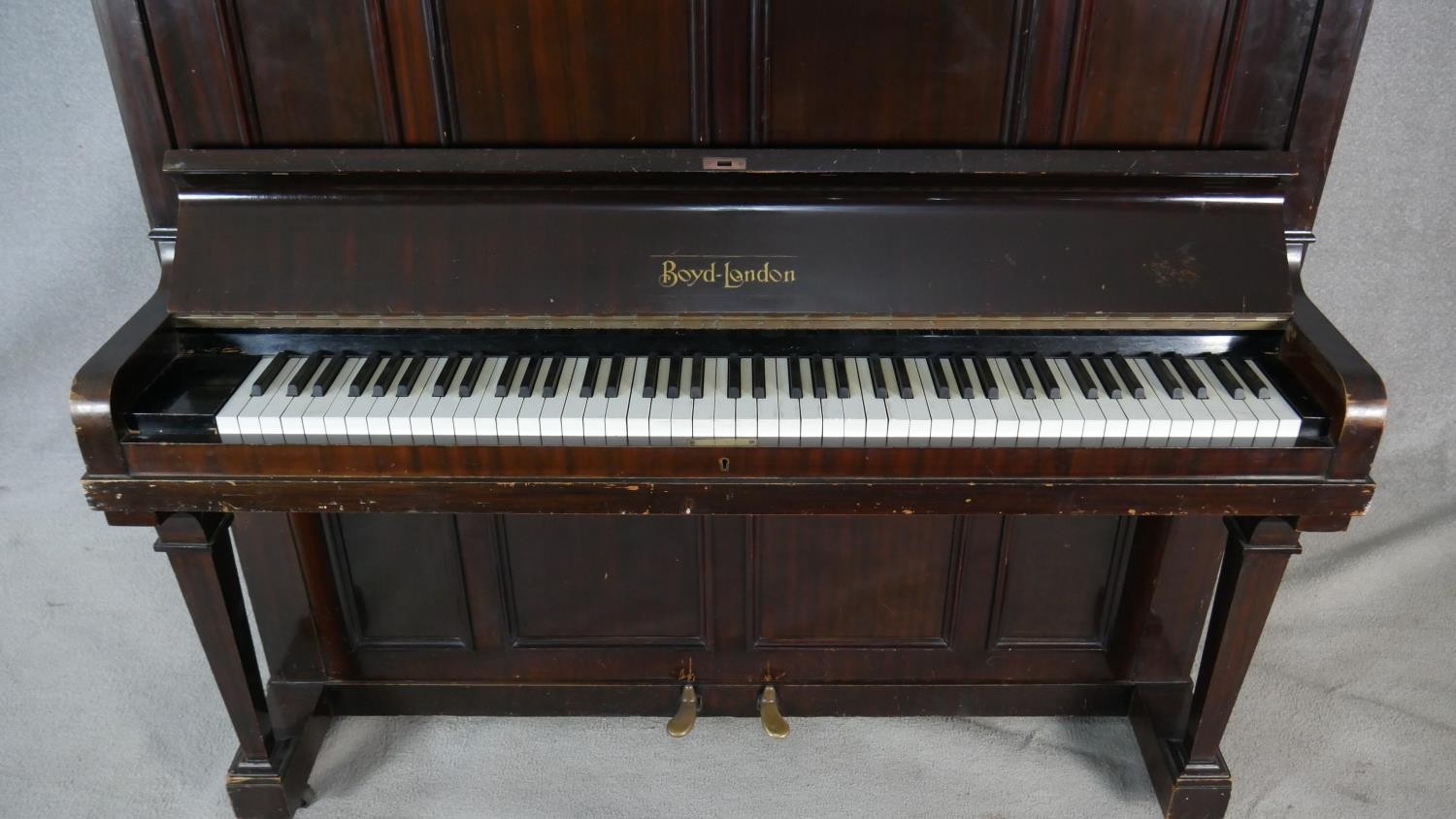 A Boyd of London mahogany cased upright piano with maker's mark to the iron frame. H.131.5 W.148 D. - Image 2 of 4