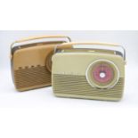 Two vintage bakelite Bush radios with carrying handles. H.28cm