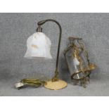 A victorian style brass and engraved glass ceiling lantern along with a vintage enamel desk lamp
