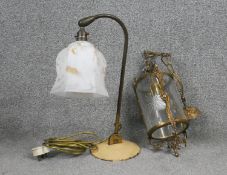 A victorian style brass and engraved glass ceiling lantern along with a vintage enamel desk lamp