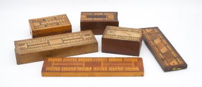 A collection of six vintage inlaid cribbage boards.