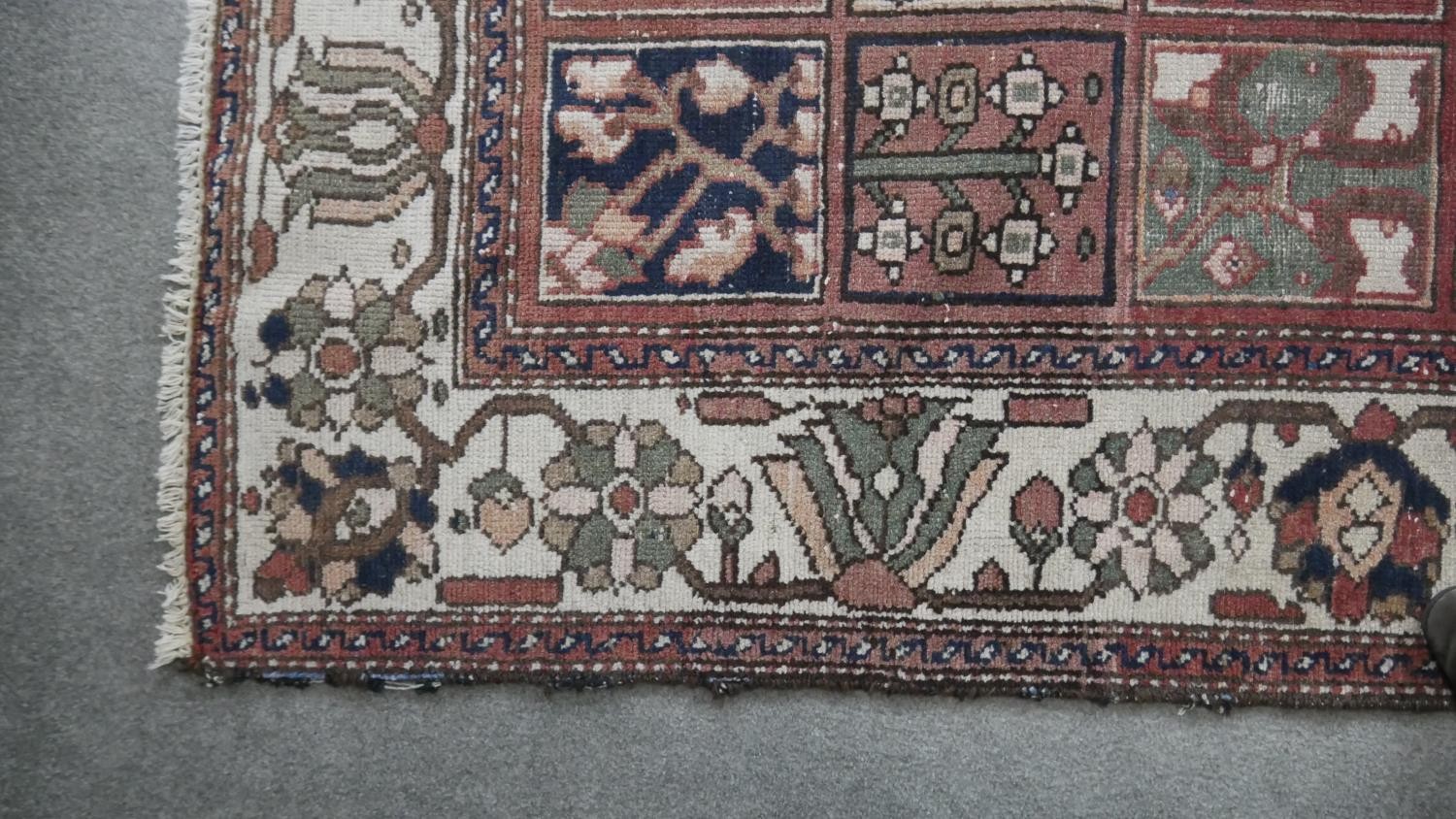 A Baktiar carpet with garden design within palmette and flowerhead borders. L.305 W.196cm - Image 2 of 3