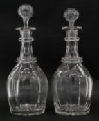 A pair of Victorian cut crystal decanters with original stoppers and star cut bases. H.29cm