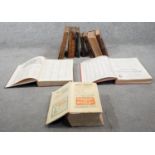 A collection of eleven antique leather bound books. including Mrs Beaton's Book of Household