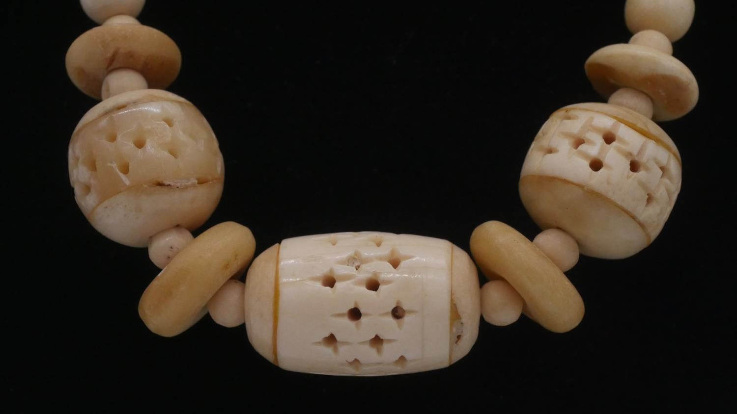 Two Victorian carved graduated ivory bead necklaces along with two Indian pierced bone bead - Image 5 of 10