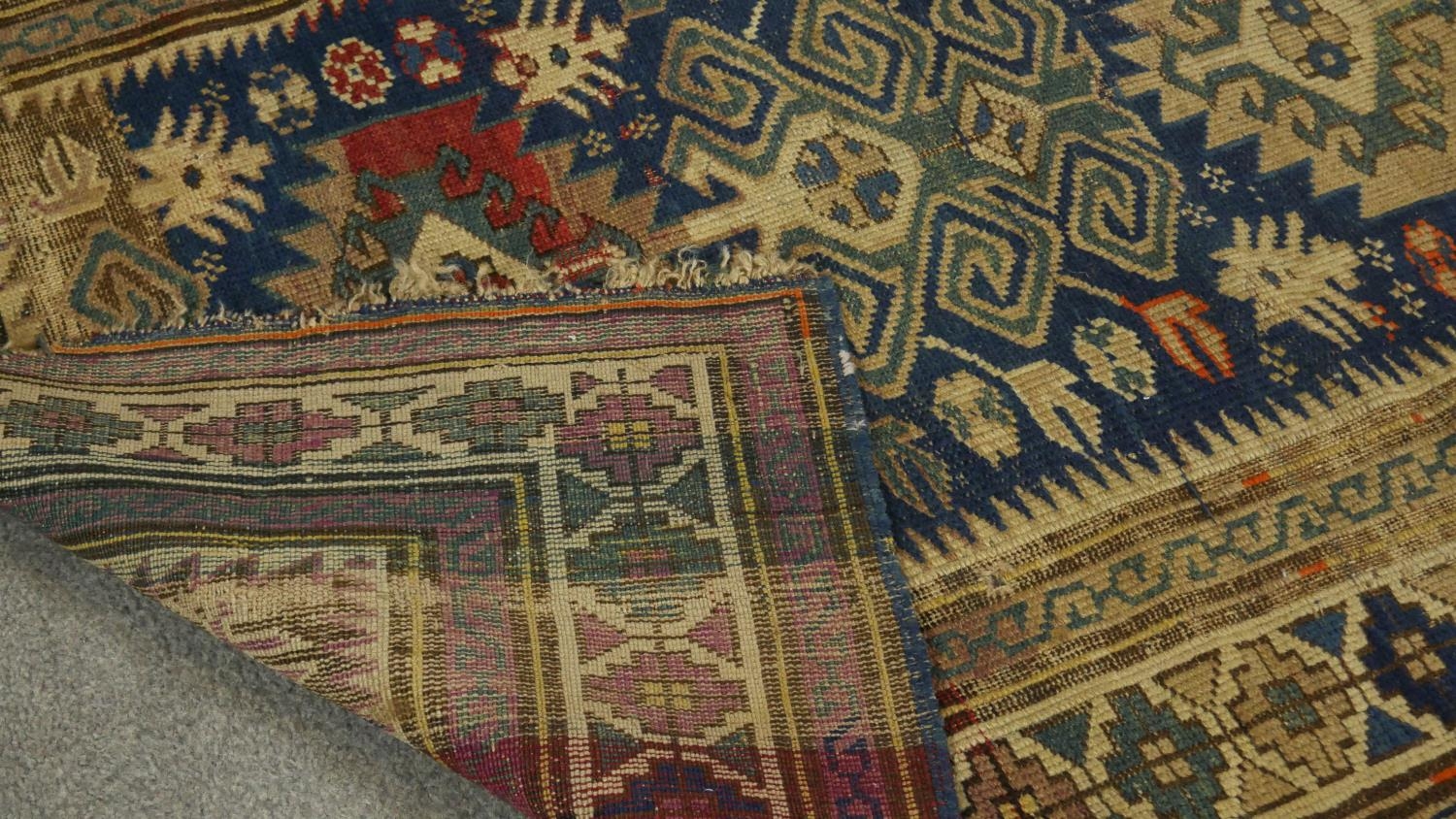 A Kazak rug with central pole medallions in stylised multiple borders. L.151 W.105 - Image 3 of 3