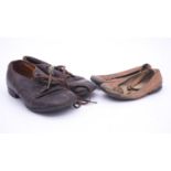 Two pairs of antique leather children's shoes, one with button fastening and one with laces. L.18cm
