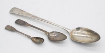 A collection of sterling silver spoons. Including a Georgian silver basting spoon hallmarked SBIB