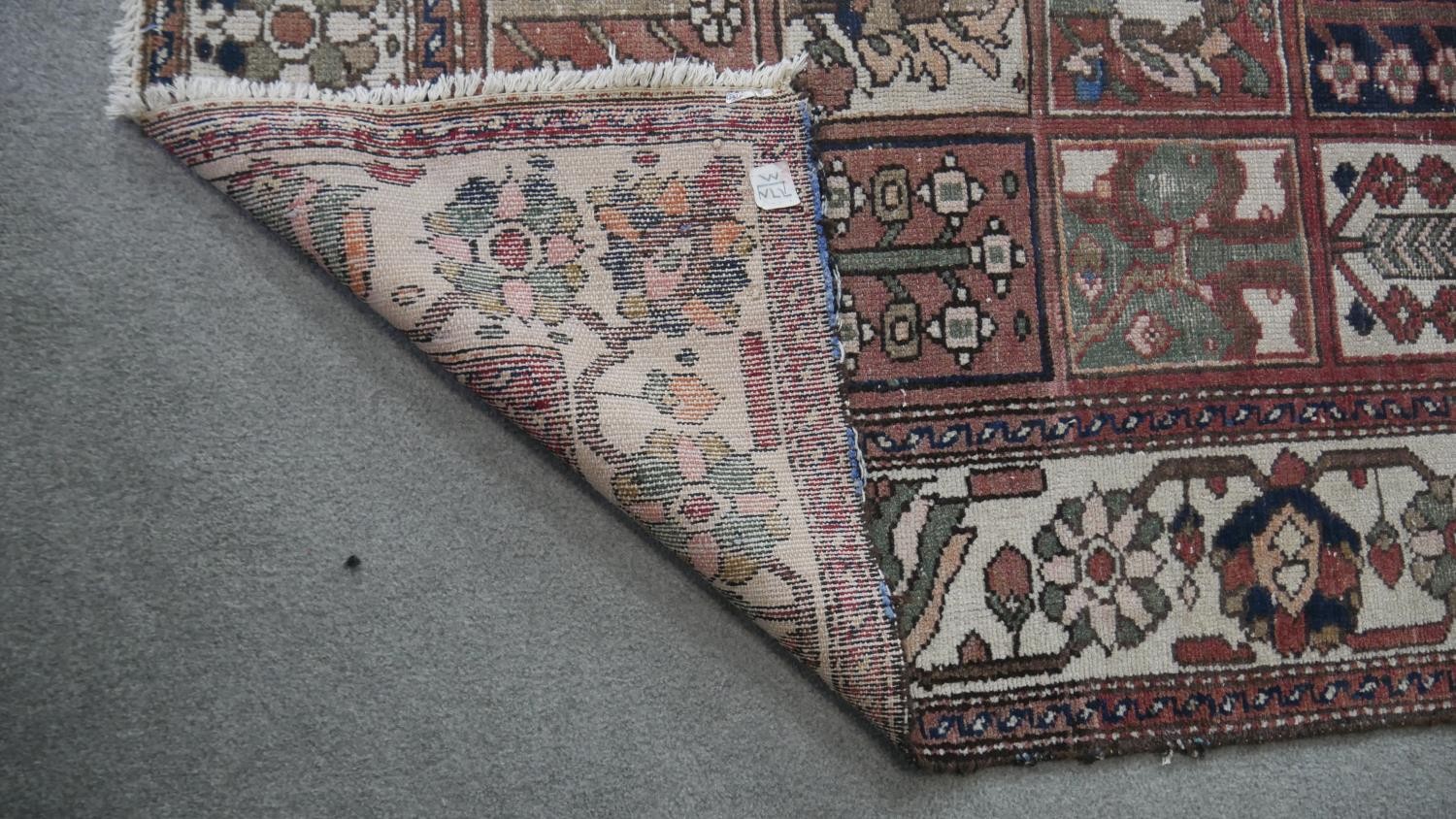 A Baktiar carpet with garden design within palmette and flowerhead borders. L.305 W.196cm - Image 3 of 3