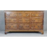 A George lll Lancashire mule chest with lift up lid and two rows of dummy drawers above three base