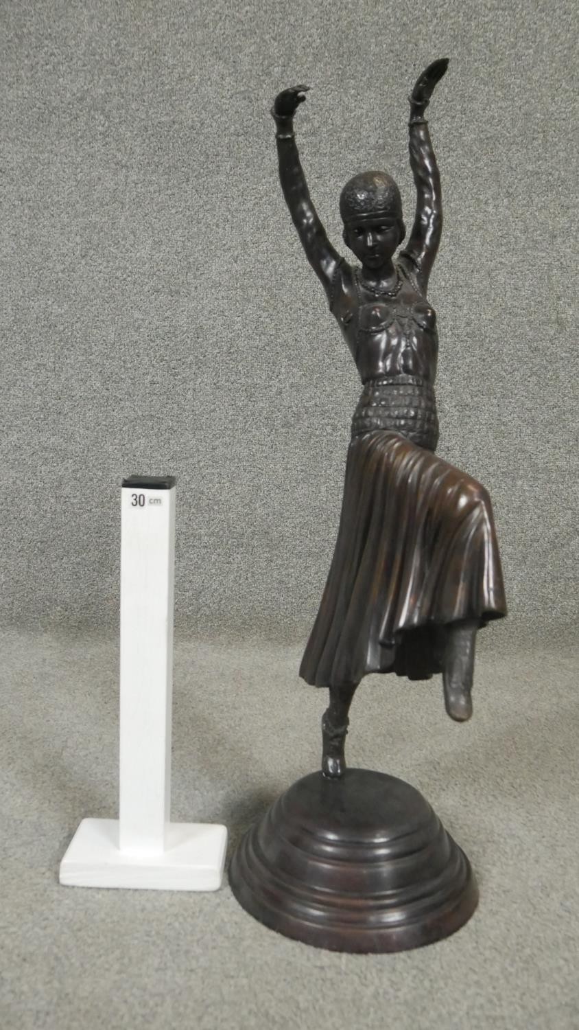 An Art Deco style spelter sculpture of a female dancer in period clothing with headdress, on a - Image 5 of 5