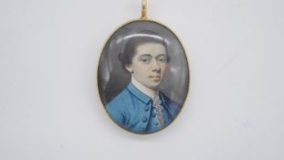 A 19th century red leather cased oval miniature on ivory pendant of Walter Pollock, banded agate