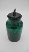 A 19th century turquoise glass apothecary jar with stopper filled with a large collection of antique