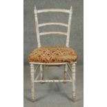 A late 19th century upholstered bedroom chair in original paint. H.82cm
