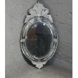 A vintage Venetian mirror in floral etched glass frame. H.85 W.48