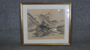 A framed and glazed Japanese ink on silk, mountain landscape, stamped with artists seal. H.36 W.50cm