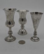 Three engraved Kiddush cups, two silver and and one plated. One by J Zeving, Chester and one by
