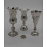 Three engraved Kiddush cups, two silver and and one plated. One by J Zeving, Chester and one by