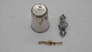 A Russian silver engraved shot glass with Art Nouveau floral design, Kokshnik mark and makers mark