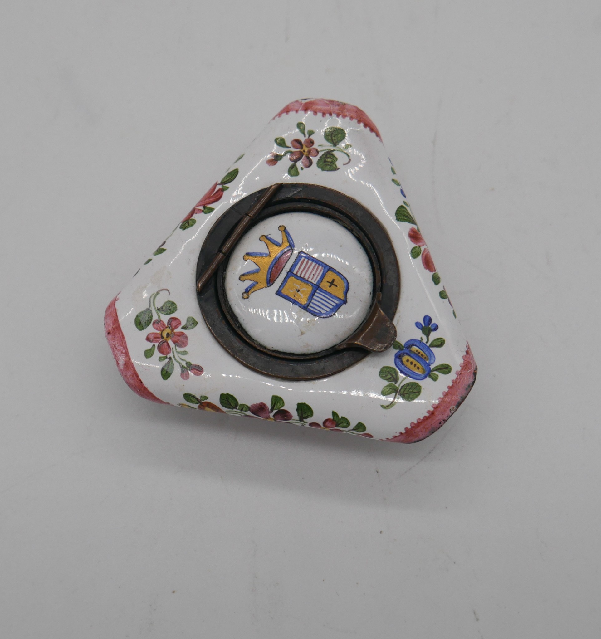 A late 19th century enamel patch box in the form of a tricorn hat, the white ground decorated with - Image 3 of 3