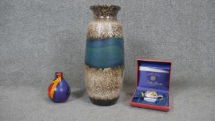A collection of ceramics and metal ware. Including a Poole pottery multi colour glaze vase, a West