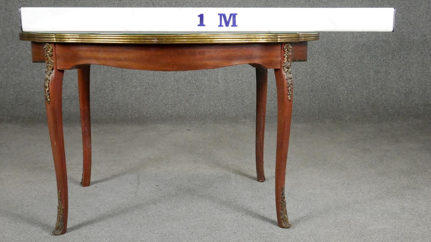 An Italian walnut and floral inlaid occasional table with shaped glass top on ormolu mounted - Image 5 of 5