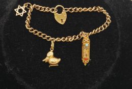 A 9 carat gold curb link charm bracelet with 18 carat gold duck charm and 14 carat gold filigree