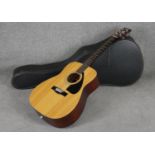 Yamaha FG-410 series acoustic guitar, made in Taiwan, together with hard case.