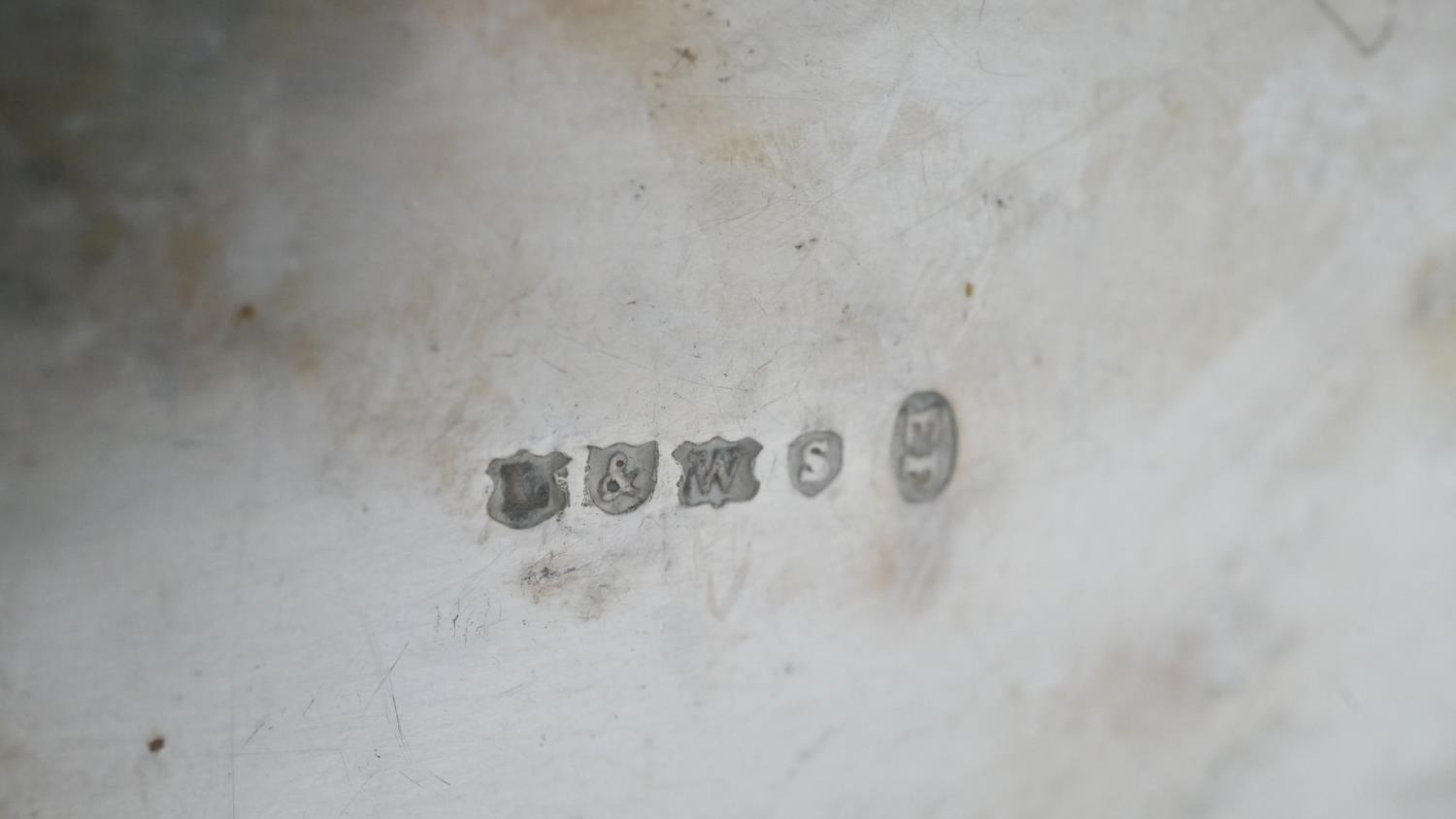 A collection of silver plate. Including a swing handled pierced basket, two C-scroll handled gravy - Image 3 of 9