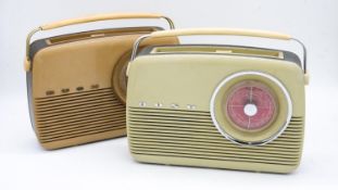 Two vintage bakelite Bush radios with carrying handles. H.28cm