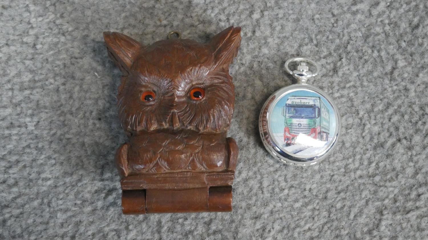 A carved oak Black Forest pocket watch holder in the form of an owls head, with orange glass eyes - Image 3 of 3