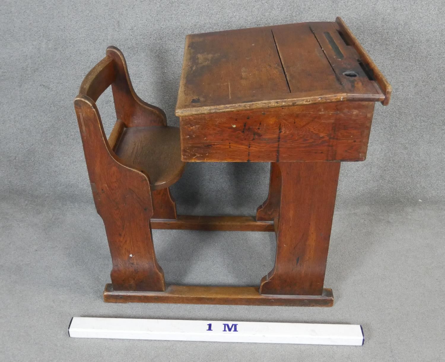 A vintage oak school desk with integral bench seat. H.88 W.90 D.69cm - Image 2 of 4