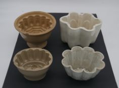 A collection of four 19th century jelly moulds.