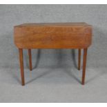 A 19th century mahogany drop flap Pembroke table on square tapering supports. H.65 W.76 D.47