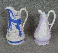 Two 19th century Jasperware ceramic Samuel Alcock jugs. One lavender parian with Naomi & her
