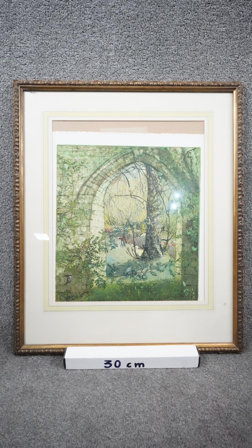 A framed and glazed lithograph of a garden with stone archway. Signed. (Mount slipped, signature - Image 5 of 5