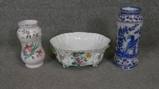 A collection of Majolica. Including a planter with floral design, a hand painted vase P. de Alse