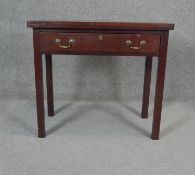 A 19th century mahogany baize lined card table with gateleg action on square section supports. H.