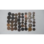 A collection of forty six British and world coins and medals. Including some silver and Georgian