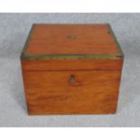 An early 19th century satinwood and brass bound box with fitted interior. H.21 W.29 D.26cm