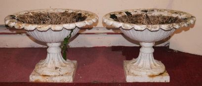 A pair of painted Georgian style cast iron garden planters. H.40 D.58cm