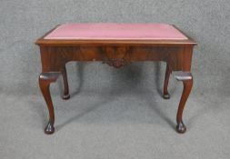 A vintage mid Georgian style walnut stool on cabriole supports with shell carving to the frieze. H.
