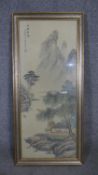 A framed and glazed vintage Chinese ink painting on paper of a mountain landscape with artists seal.